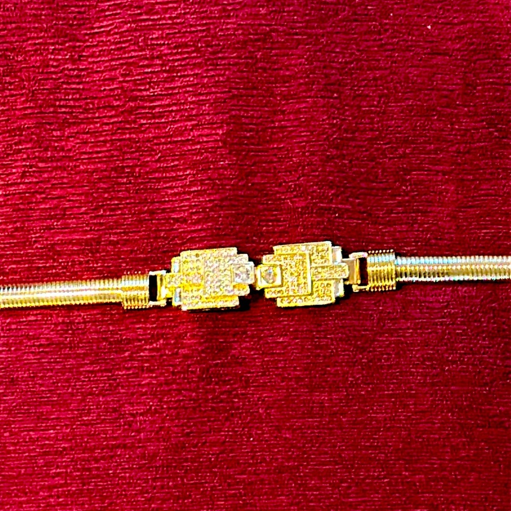 Gold metal dress belt with rhinestone (?) buckle